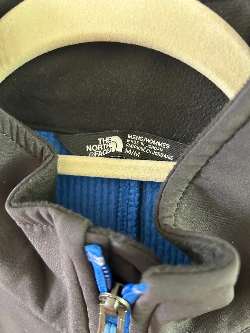 The North Face Black Jacket with Blue Accents